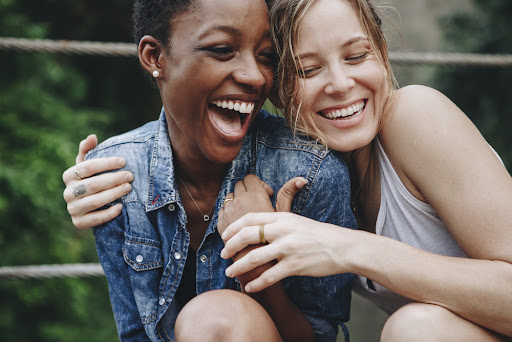 two girls talking about wellness tips